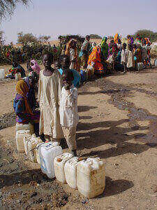 Lines for water---when it is available---can seem interminable; often there is simply not enough water for all in concentrated camp areas.